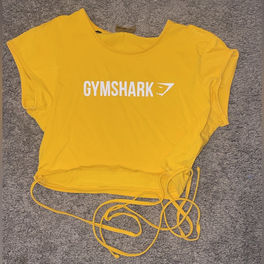 Gymshark yellow workout top. Tie around detail. Size medium.
